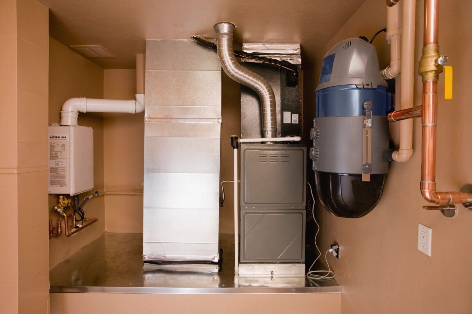 A view of the inside of a home with a gas furnace.